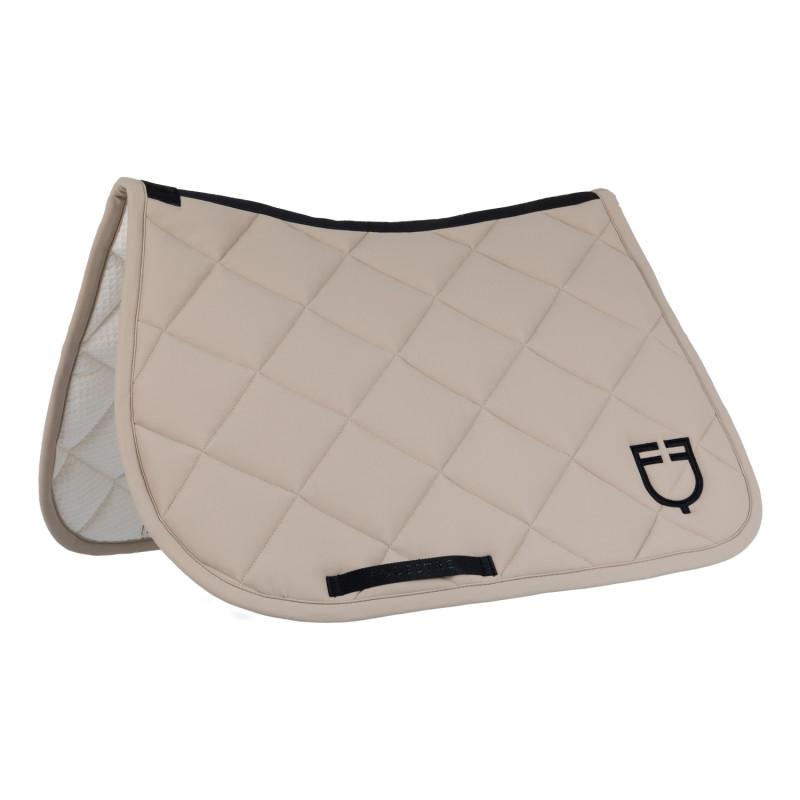 Jumping saddle pad with diamond quilting and embroidered logo