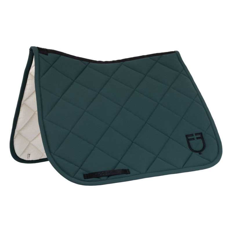 Dressage saddle pad with diamond quilting and embroidered logo